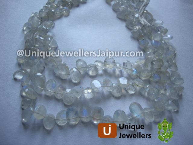 White Rainbow Cut Oval Beads